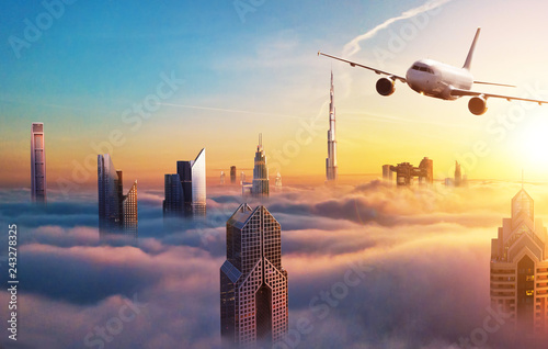 Photography Commercial jet plane flying above Dubai city