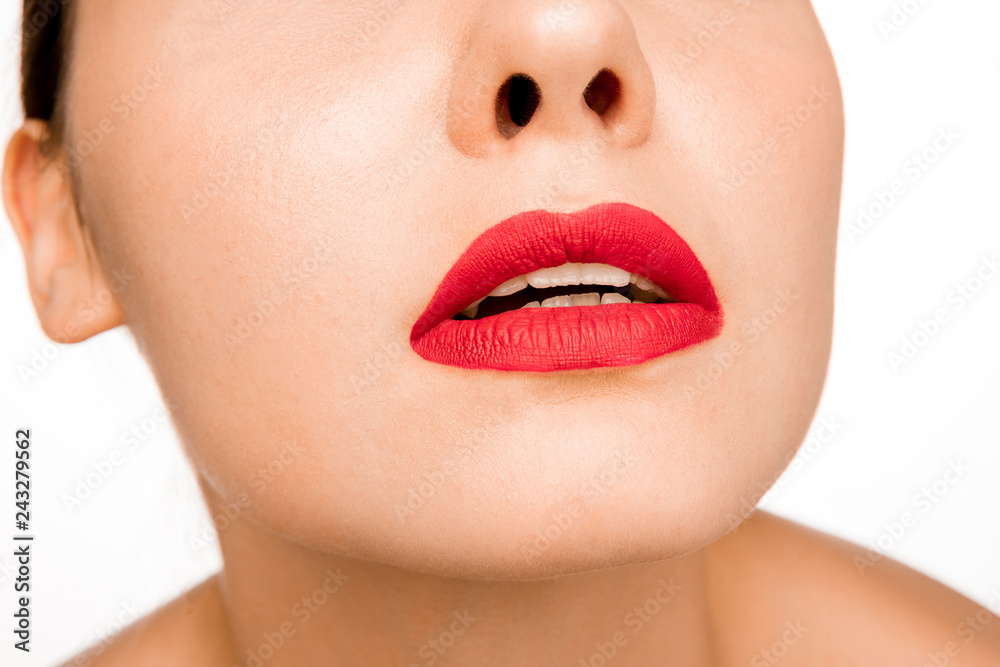 Fototapeta premium Sexy Red Lip. Close-up Beautiful lips. Make-up. Beauty Model Woman's Face close-up