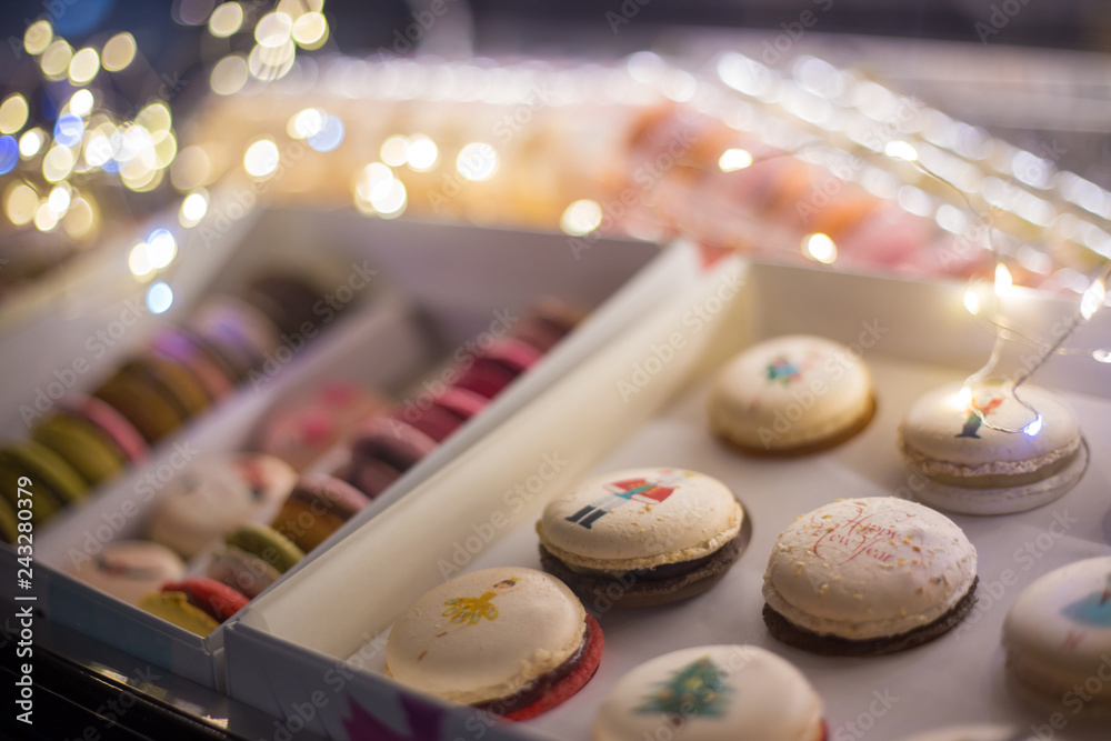 Box with french dessert - multicolored tasty macaroons. French cuisine, Christmas, candy, holiday, new year and food concept