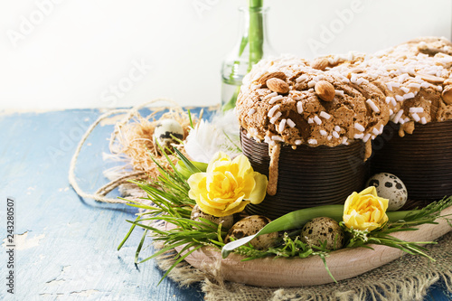 Colomba - italian easter dove cake on old rustic grey board. Selective focus, free text space. photo