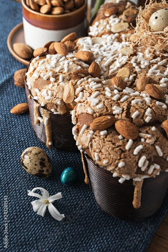 Colomba - italian easter dove cake on old rustic board. Selective focus, free text space.