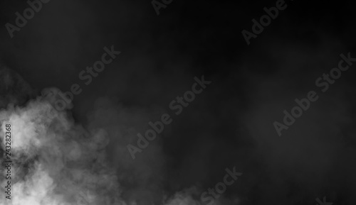 Fog and mist effect on isolated black background for text or space