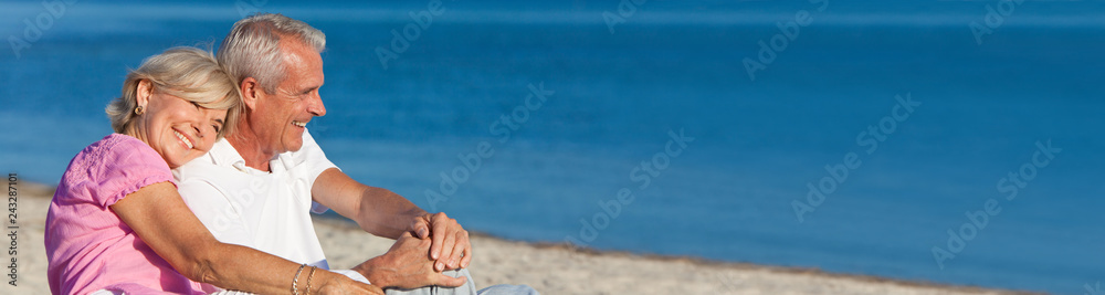 Happy Romantic Senior Couple Sitting Together on Beach - obrazy, fototapety, plakaty 