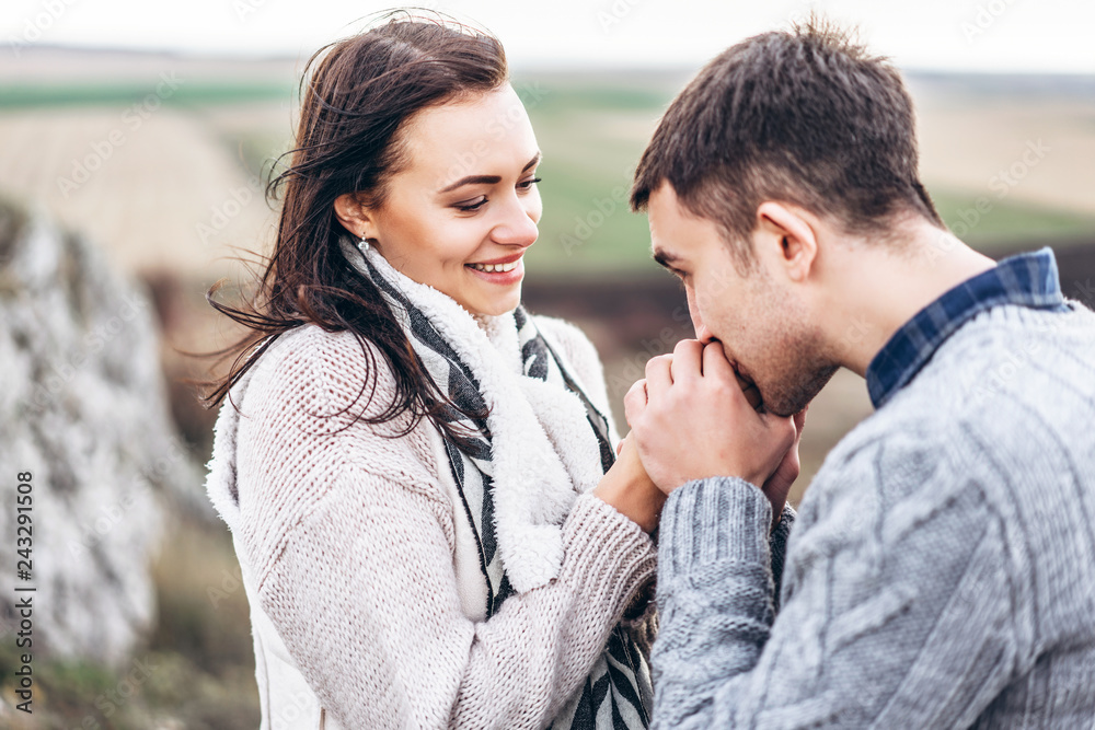 Romantic young couple spending time together outdoor. Romantic young couple spending time together outdoor.