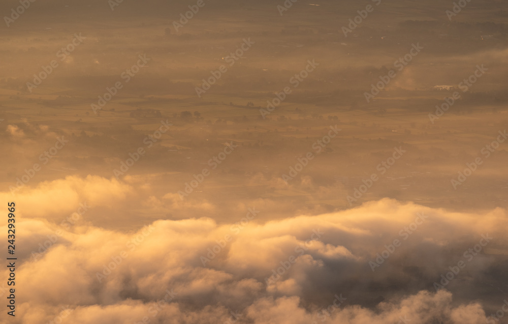 Beautiful mountain and morning sunrise over the sea of mist. Mon Sone View point , Doi Pha Hom Pok National Park in Chiang Mai,Thailand. Beautiful mountain and morning sunrise over the sea of mist. Mon Sone View point , Doi Pha Hom Pok National Park in Chiang Mai,Thailand.