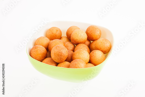 Traditional Colombian buuelo - Deep Fried Cheese Bread on white background photo