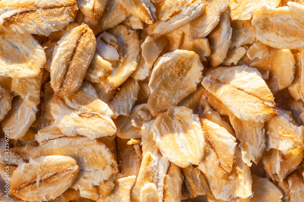 bright dry oat-flakes. background, texture, macro. bright dry oat-flakes. background, texture, macro.