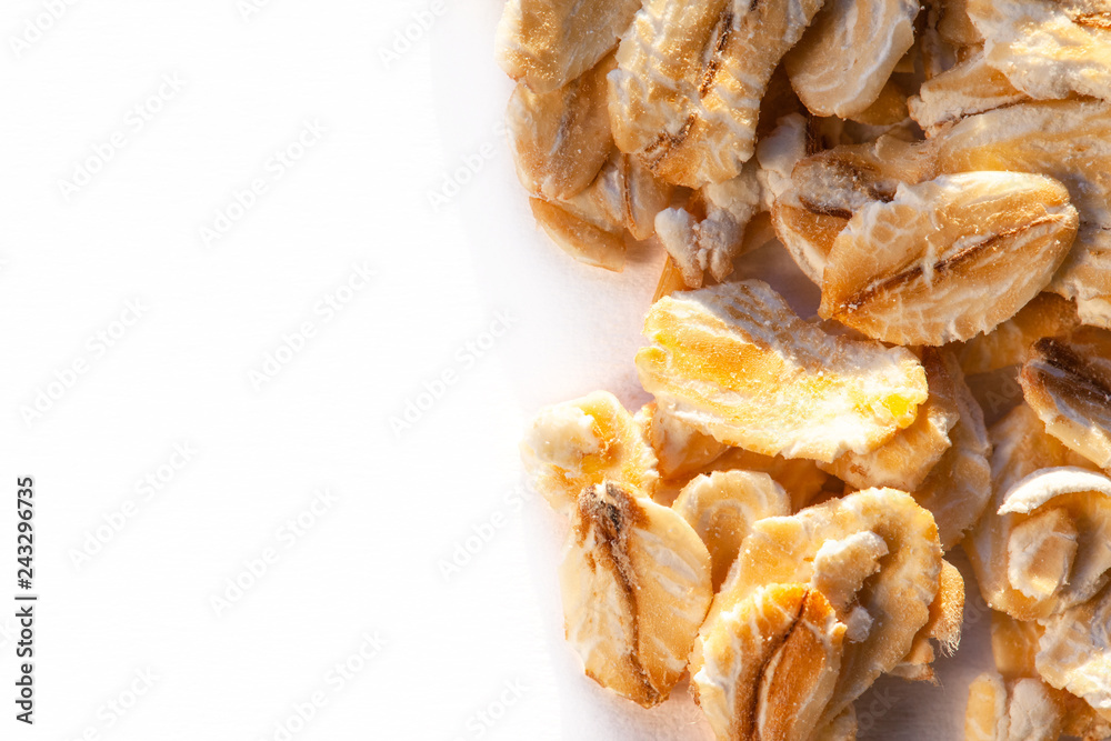 bright dry oat-flakes. background, texture, macro, copy space bright dry oat-flakes. background, texture, macro, copy space