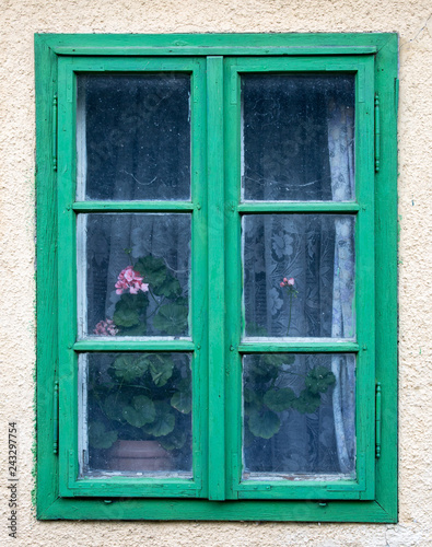 old wooden green window