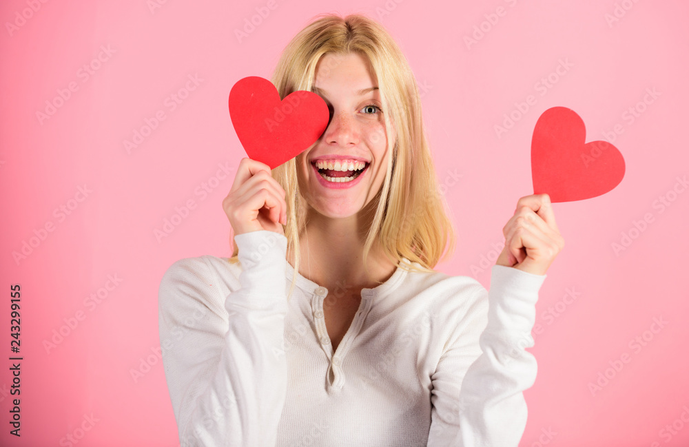 Girl hold heart symbol love and romantic pink background. Woman celebrate love. Girl cheerful fall in love. Love on her mind. Valentines day has traditionally been seen as more significant for women Girl hold heart symbol love and romantic pink background. Woman celebrate love. Girl cheerful fall in love. Love on her mind. Valentines day has traditionally been seen as more significant for women