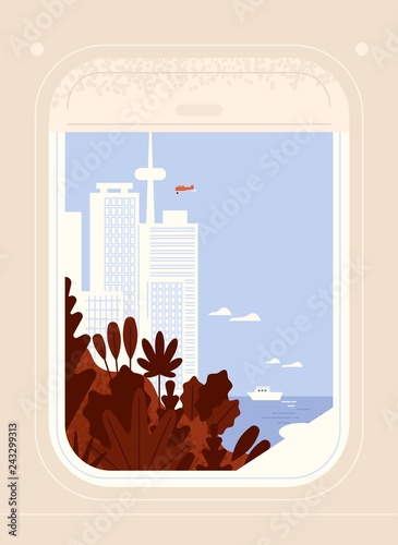Aircraft or plane window view on seaside city downtown with skyscrapers and m...