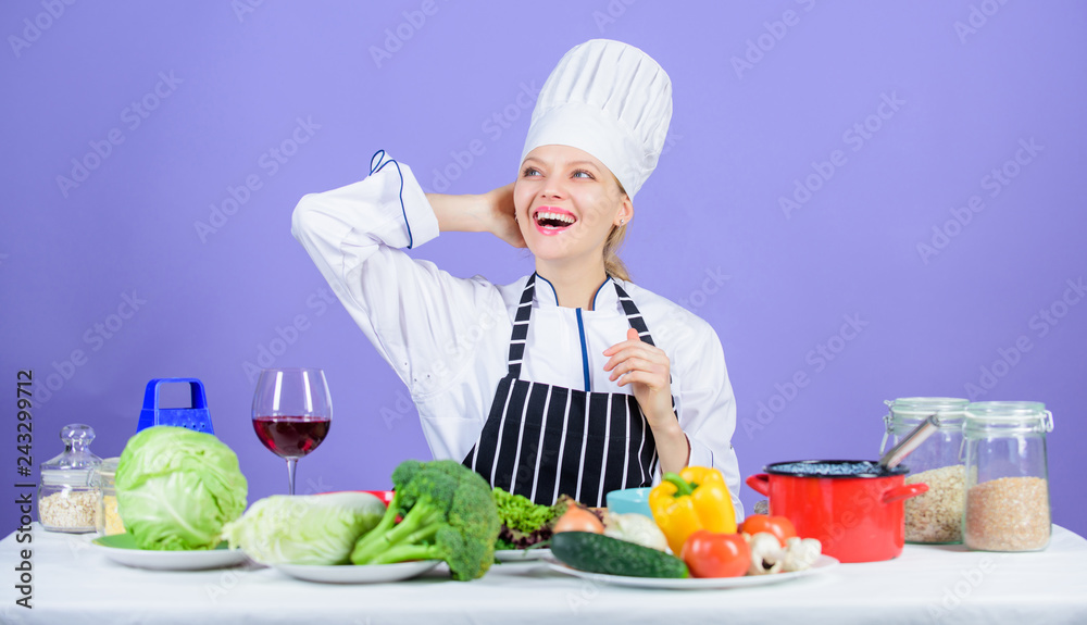 Gourmet main dish recipes. Girl in hat and apron. Delicious recipe concept. Cooking healthy food. Fresh vegetables ingredients for cooking meal. Lets start cooking. Woman chef cooking healthy food Gourmet main dish recipes. Girl in hat and apron. Delicious recipe concept. Cooking healthy food. Fresh vegetables ingredients for cooking meal. Lets start cooking. Woman chef cooking healthy food