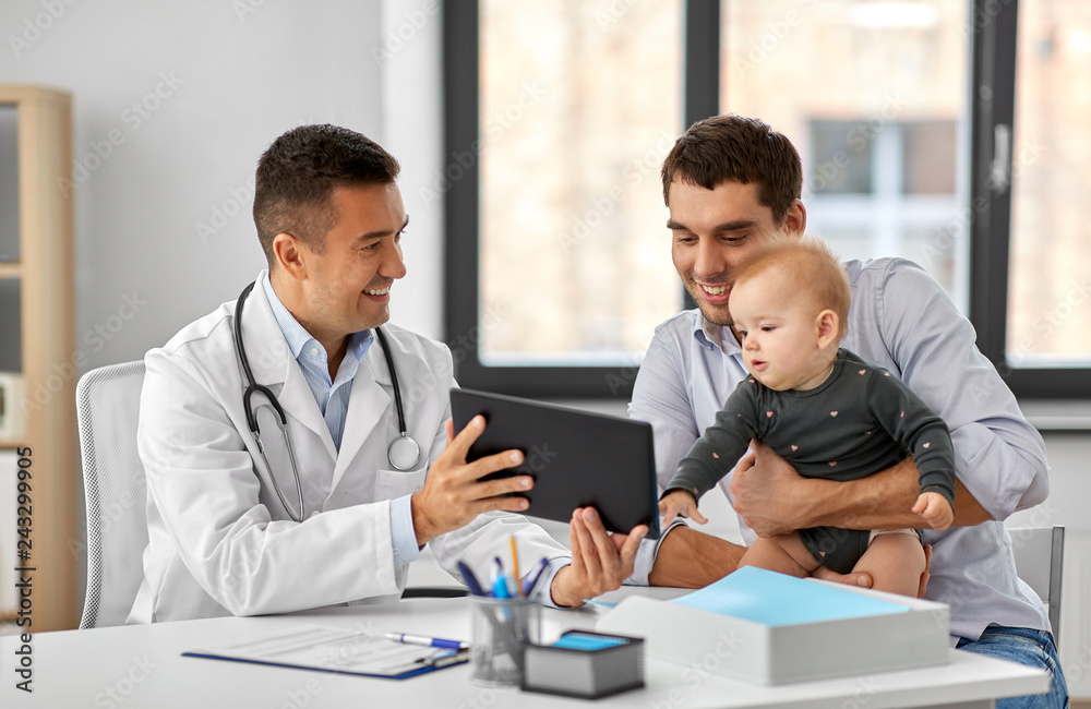 medicine, healthcare, pediatry and people concept - happy doctor showing tablet computer to father with baby daughter at medical office in hospital medicine, healthcare, pediatry and people concept - happy doctor showing tablet computer to father with baby daughter at medical office in hospital