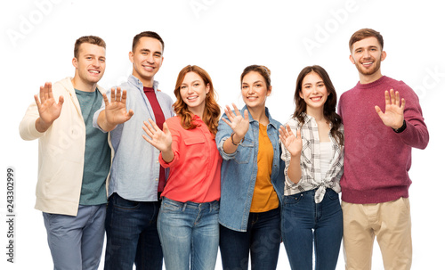 friendship and people concept - group of smiling friends over white background