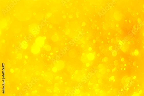 Abstract yellow gradient with bokeh light effect background