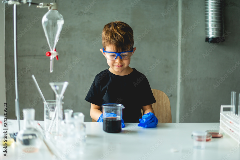 Preschooler scientist in laboratory Preschooler scientist in laboratory