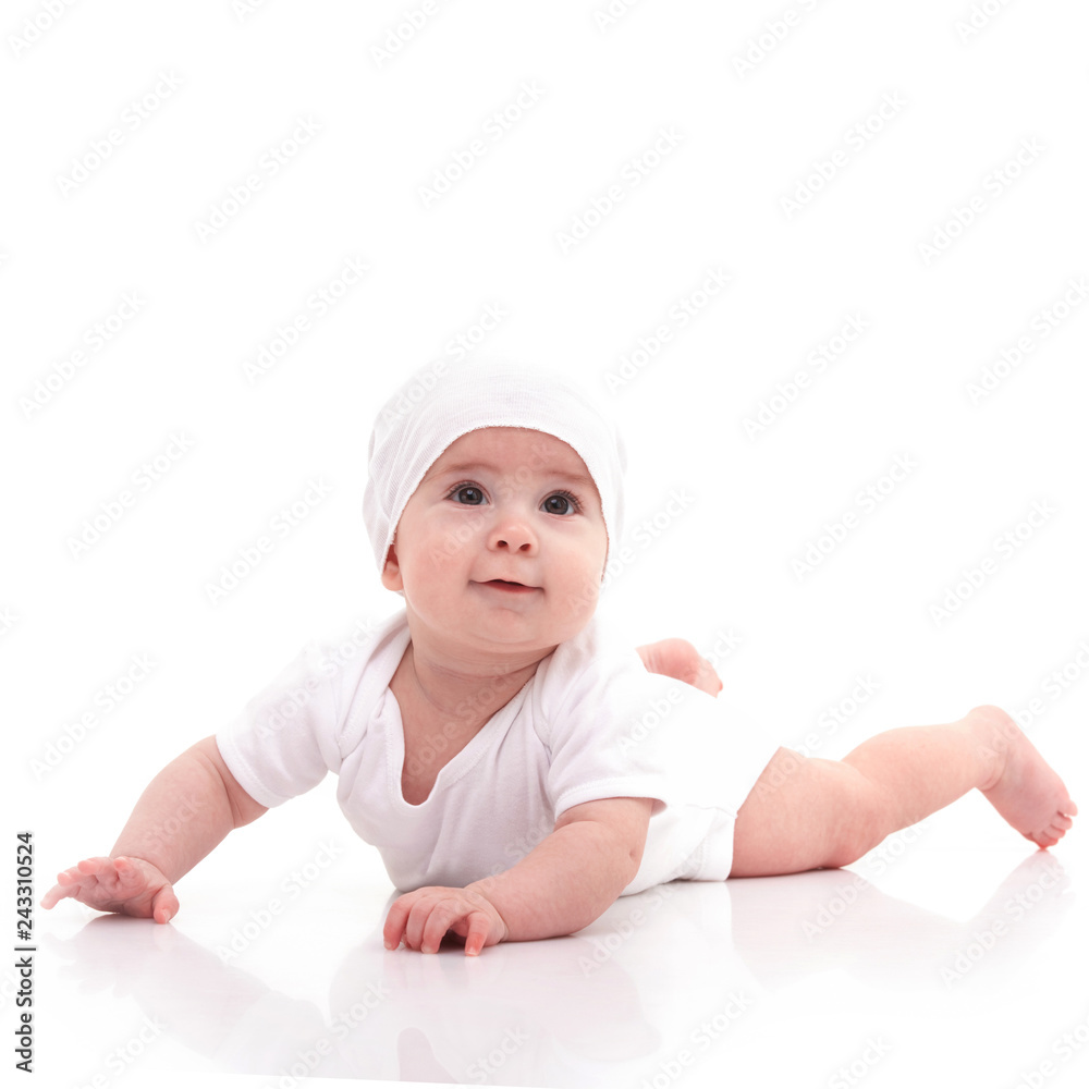 Cute baby isolated on white background. Happy childhood. Close up portrait of happy baby. Fun kid in white pajama on white Cute baby isolated on white background. Happy childhood. Close up portrait of happy baby. Fun kid in white pajama on white