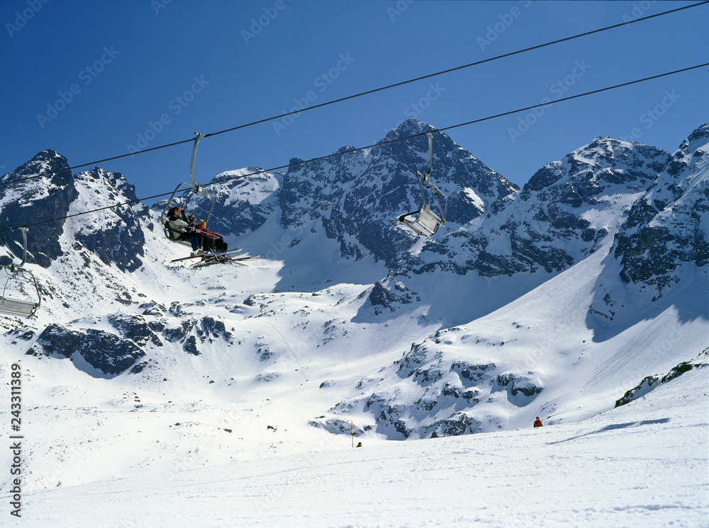 Fototapeta premium Tatry mountain, Poland - February, 2008: ski lift on the Kasprowy Wierch, Hala Gasienicowa