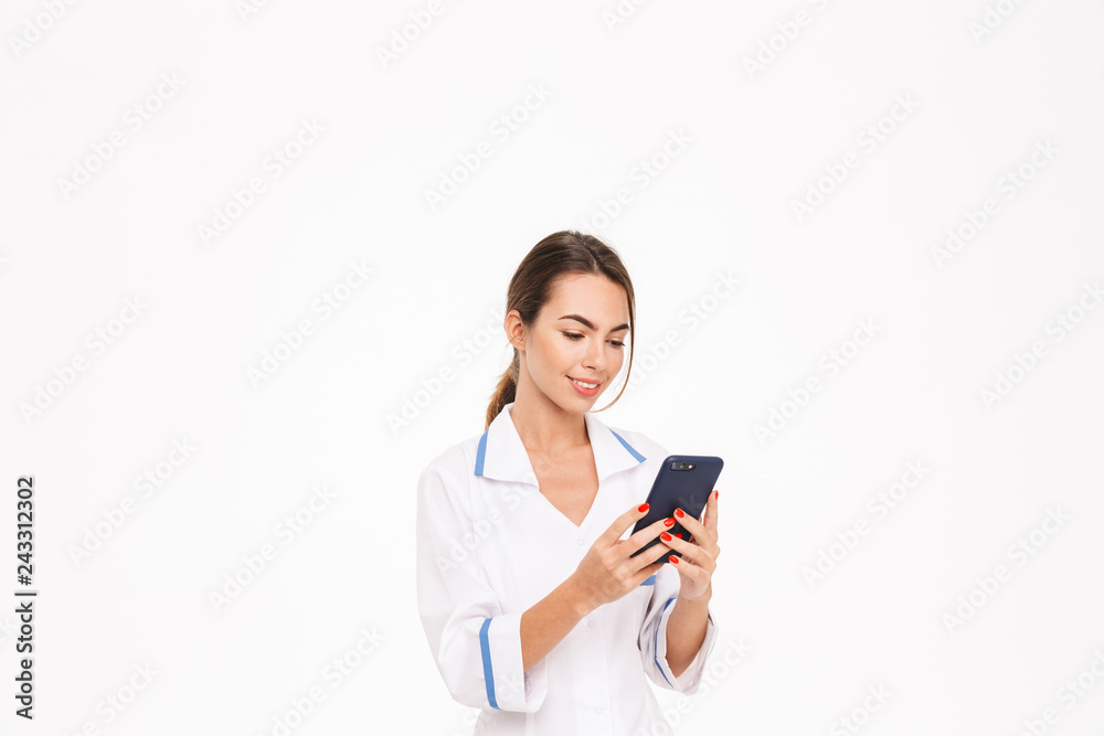 Confident young woman doctor wearing uniform
