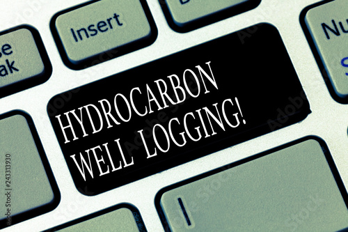 Text sign showing Hydrocarbon Well Logging. Conceptual photo record of the geologic formations of a borehole Keyboard key Intention to create computer message pressing keypad idea photo