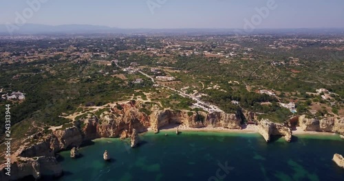 Aerial view of the coast Algarve, Portugal. Concept for top view beach of Portugal. Summer vacations