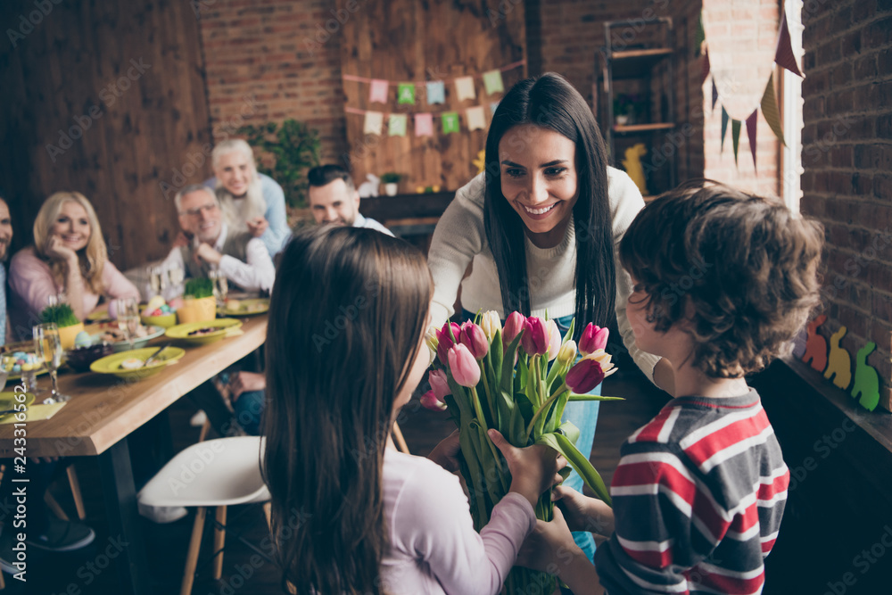 Fototapeta premium Close up photo of gathered relatives in house table little small