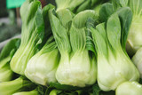 close up small choy sum with water on them a chinese vegetable