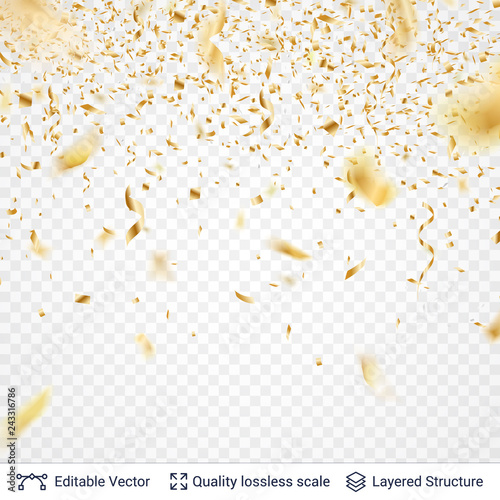 Golden festive tinsel confetti blurred in motion.