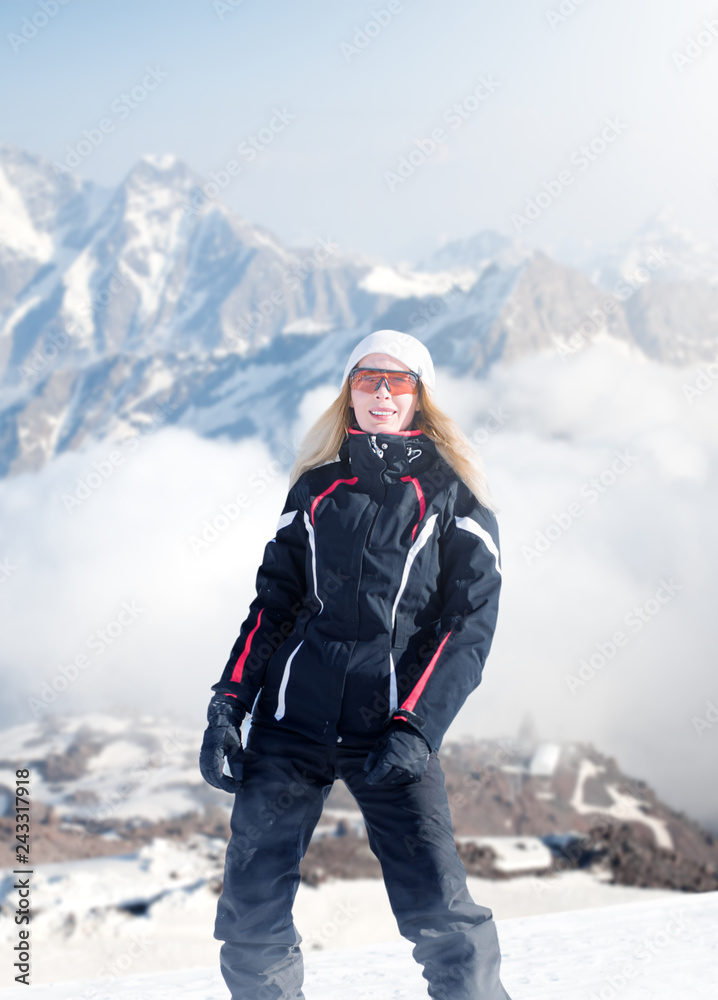 woman in winter sportswear stay on mountainside