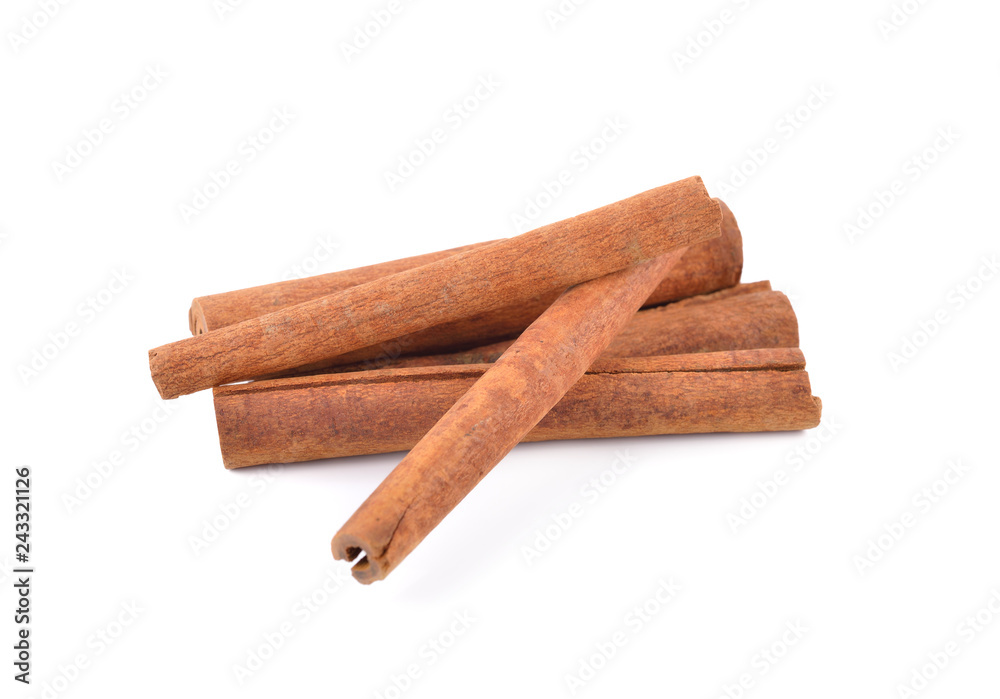 pile of dried cinnamon stick on white background pile of dried cinnamon stick on white background