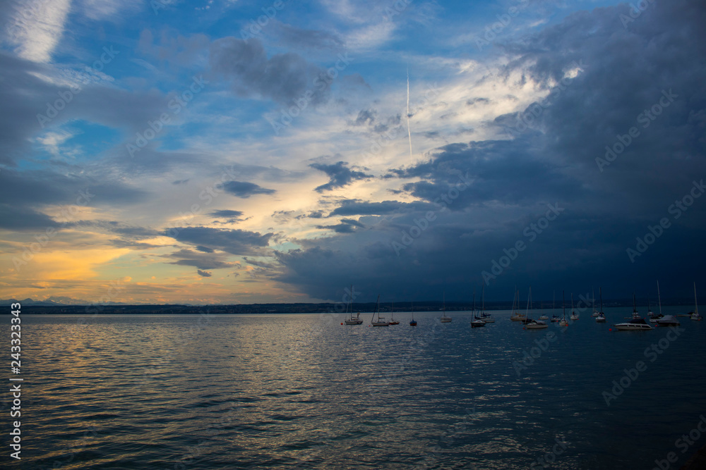 Bodensee lake sunset with view on the Alps mountains