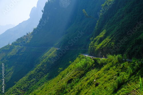 Winding roads through valleys and karst mountain scenery in the North Vietnamese region of Ha Giang / Dong Van.