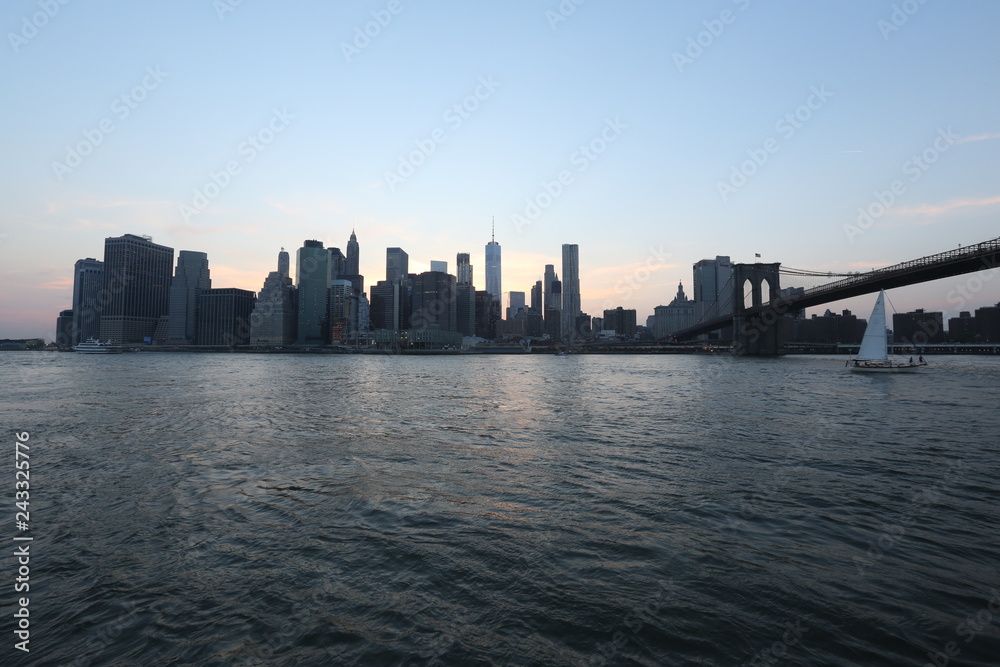 View from the sea of New York and the bridge