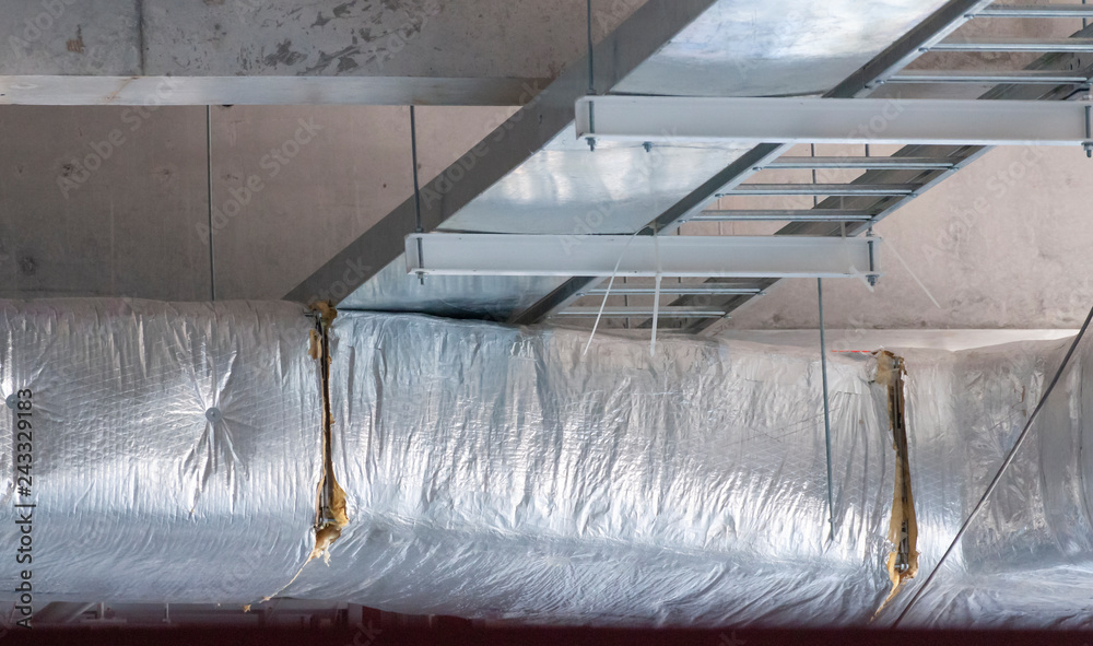 Typical installation of ducting with fiberglass insulation work combine
