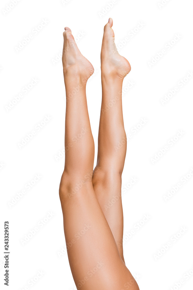 Beautiful woman lifting her legs up in air Beautiful woman lifting her legs up in air