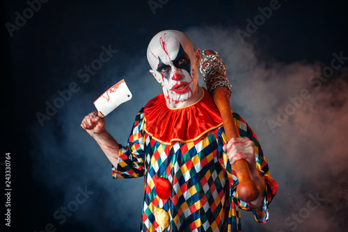 Bloody clown with meat cleaver and baseball bat