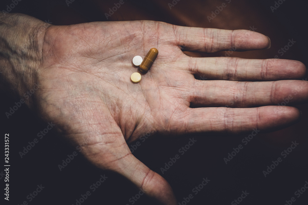 pills in the old hand