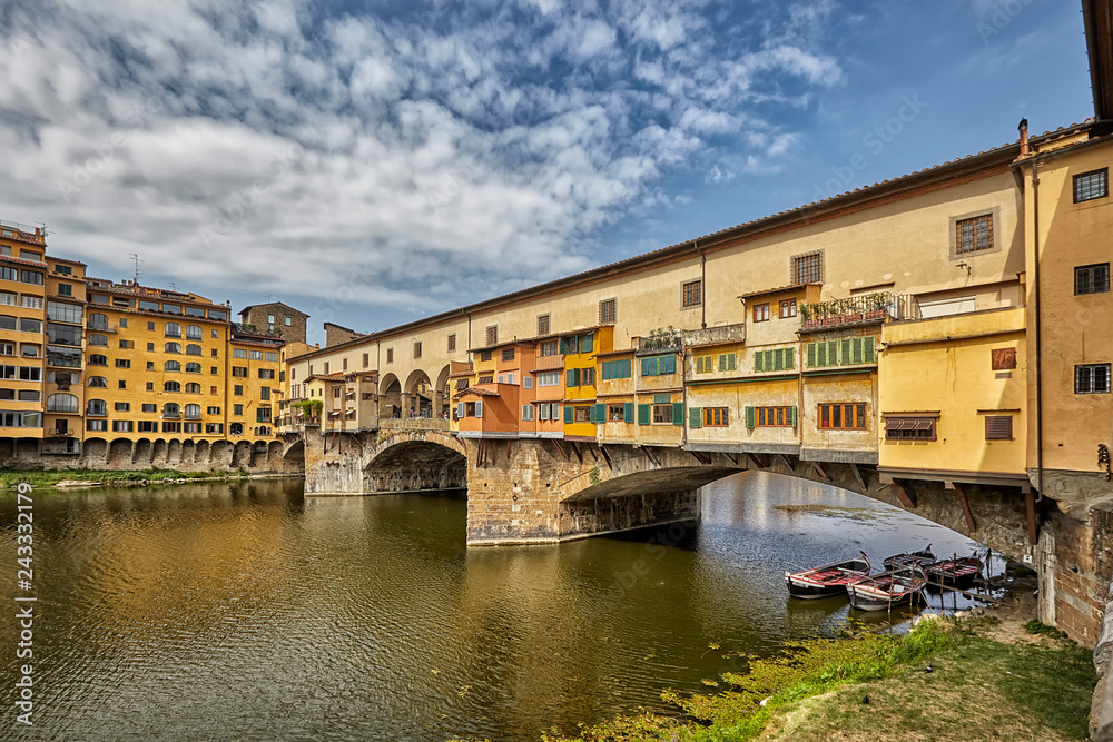 Fototapeta premium Florence or Firenze city view on Arno river, landscape with reflection. Tuscany, Italy.