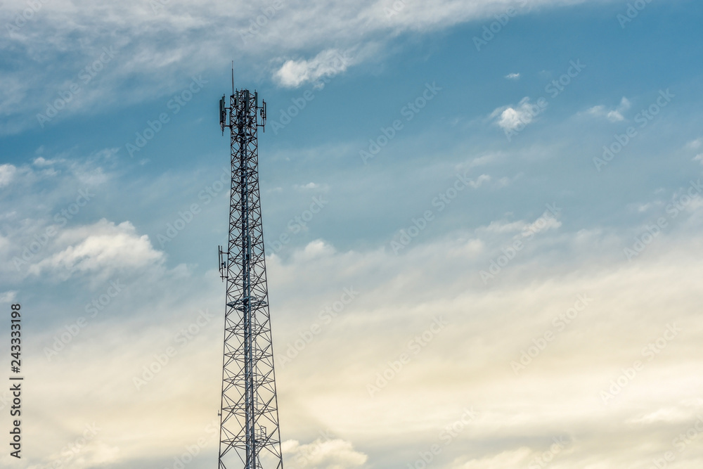 Telecommunication, wireless communication tower with evening sky background.Transmitter station tower against beautiful blue sky and clouds. Telecommunication, wireless communication tower with evening sky background.Transmitter station tower against beautiful blue sky and clouds.