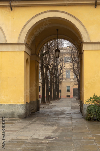 Parma  Italy. Street view through the arch in the Old town.