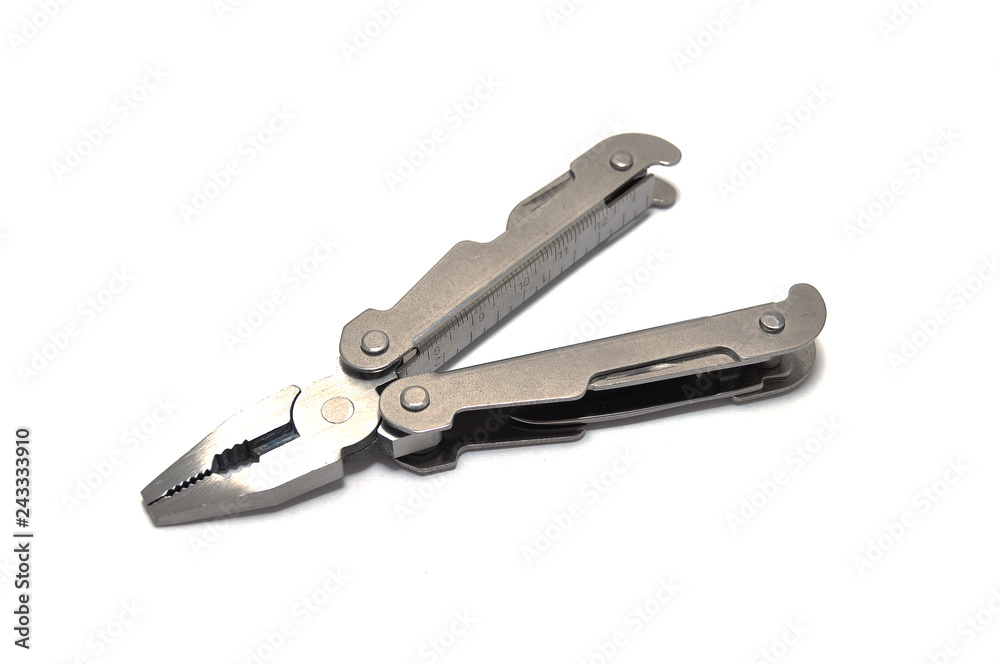 Versatile tool on white background close-up Versatile tool on white background close-up