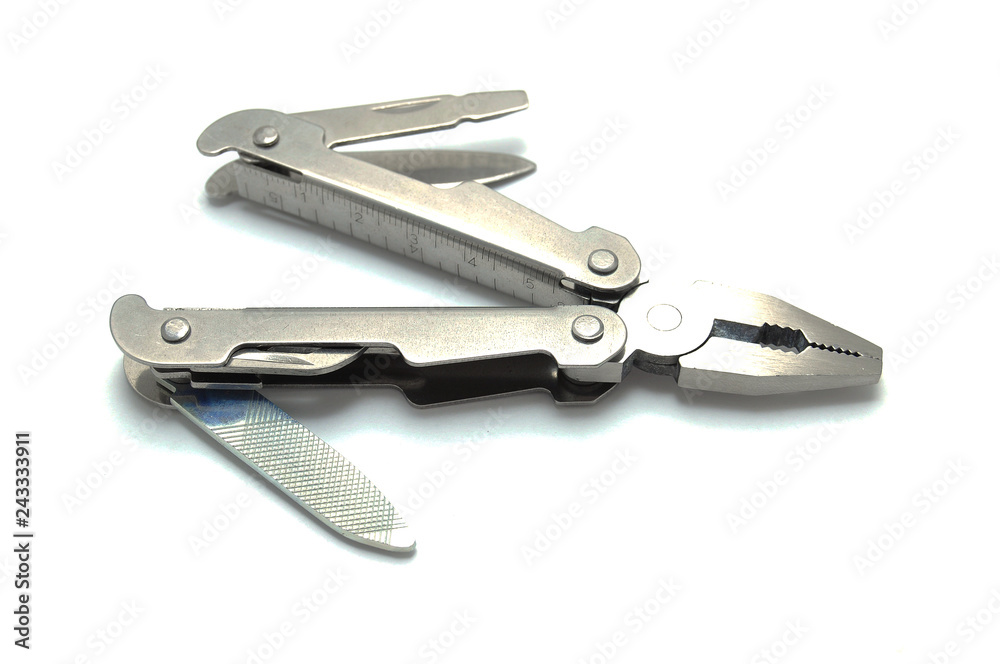 Versatile tool on white background close-up Versatile tool on white background close-up