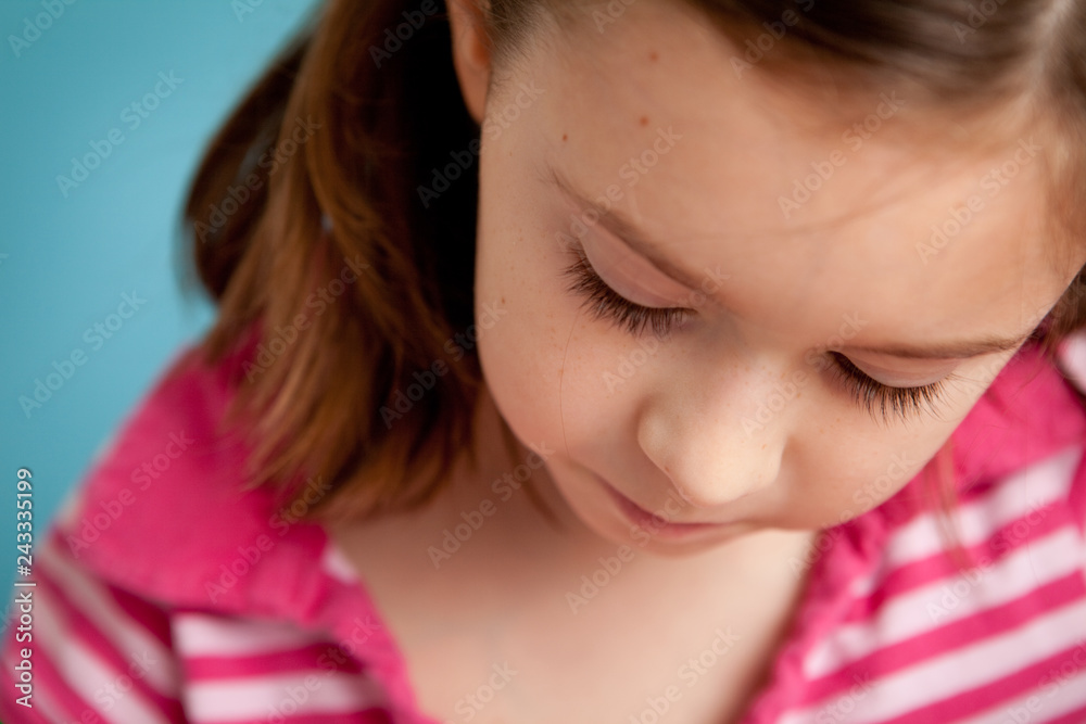 Pensive Little Girl Looking Down Pensive Little Girl Looking Down