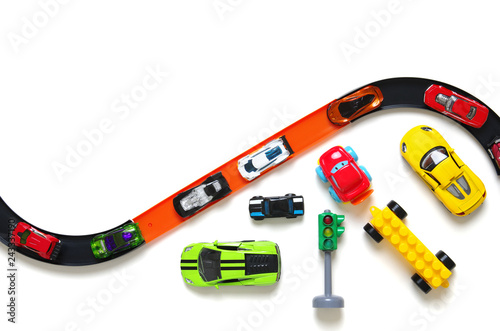 Toy car and racing track isolated on the white