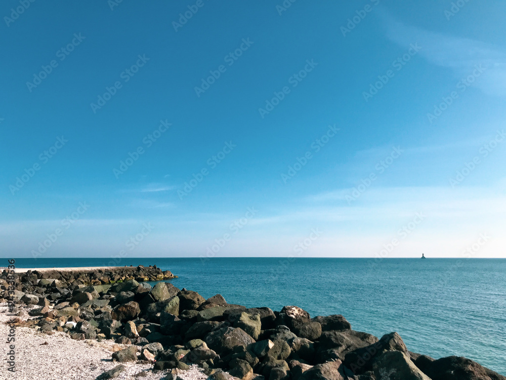 Scenic View Of Sea Against Blue Sky In Pomorie, Bulgaria. Scenic View Of Sea Against Blue Sky In Pomorie, Bulgaria.