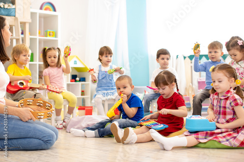 Kindergarten children playi...