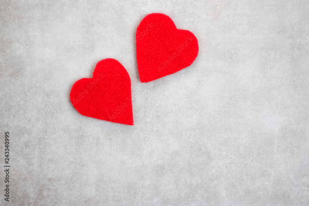Two red decorative hearts on gray background. I love you. Valentine's Day Concept. Two red decorative hearts on gray background. I love you. Valentine's Day Concept.