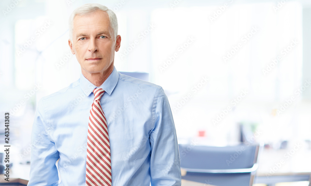 Successful professional businessman standing at office Successful professional businessman standing at office