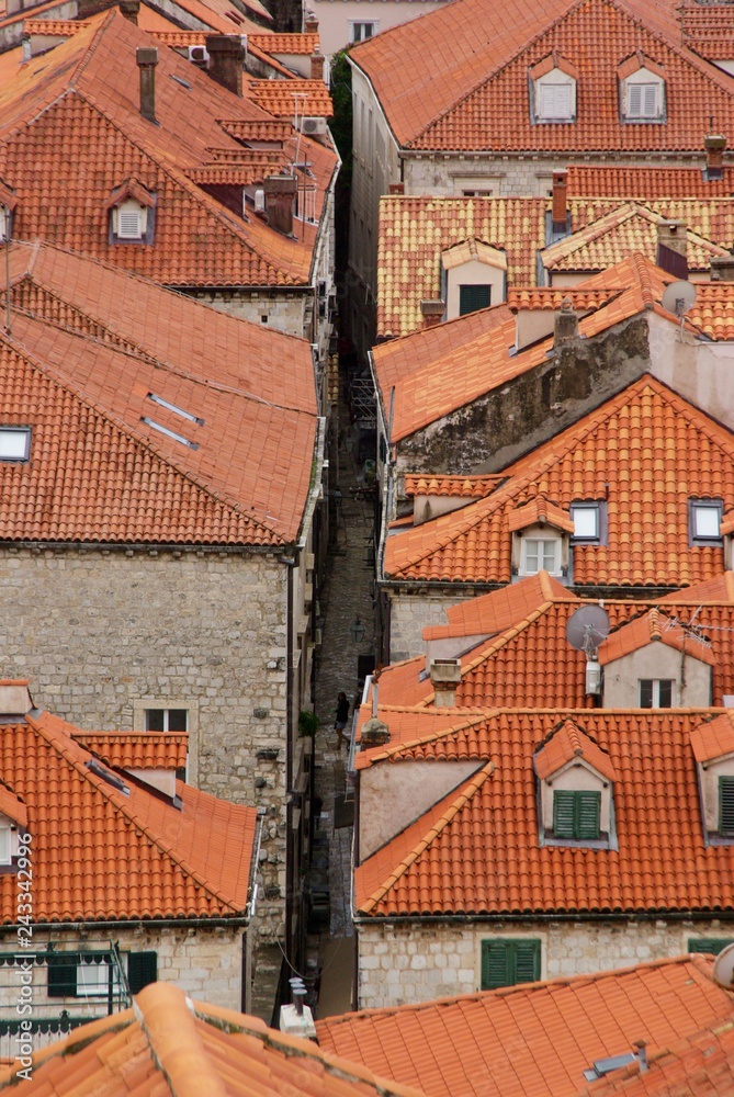 View over historic red roofs and little street in old town of dubrovnik, coratia