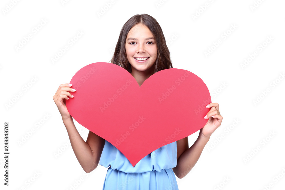 Young girl holding red paper heart on white background Young girl holding red paper heart on white background